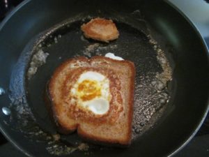 egg-in-a-hole-flipped-over-in-pan