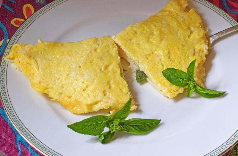 cooked quail egg omelet on white plate